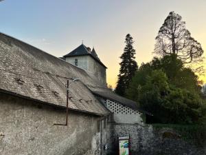 an old building with a tower on top of it at La Glycine in Chamoux-sur-Gelon