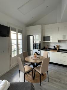 Kuchyň nebo kuchyňský kout v ubytování Apartamentos SARABIA DARRIBA