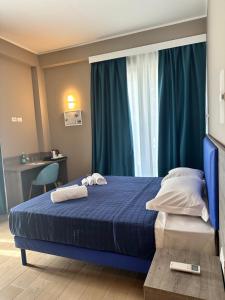 Voodi või voodid majutusasutuse Sunset Guest House toas