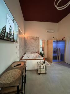 Letto o letti in una camera di Atanasia Suite