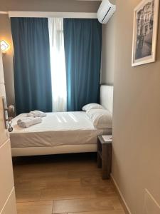 Voodi või voodid majutusasutuse Sunset Guest House toas