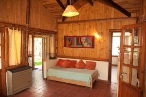 Säng eller sängar i ett rum på Cabañas Cerro Amigo