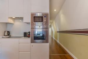 Una cocina o cocineta en King bed suite, loft with 3WC, AC & self-check-in.