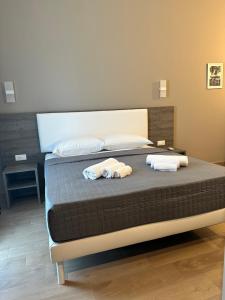 Voodi või voodid majutusasutuse Sunset Guest House toas