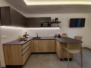 A kitchen or kitchenette at Casa Vacanze - Green Garden