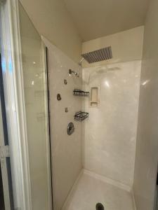 a bathroom with a shower with a shower at Sunset Zen Space in Killeen