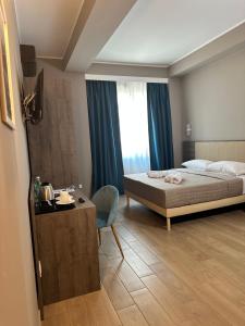 Voodi või voodid majutusasutuse Sunset Guest House toas
