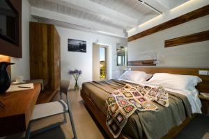 Кровать или кровати в номере Resort Il Gallo Senone