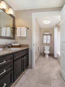 a bathroom with a sink and a toilet at WorldMark San Diego - Balboa Park in San Diego