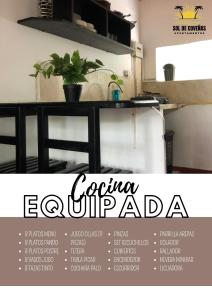 um cartaz para uma cozinha com uma mesa com uma planta em Apartamentos Sol de Coveñas em Coveñas