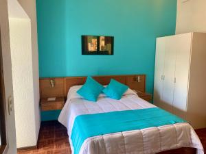 Postel nebo postele na pokoji v ubytování Hotel Concorde