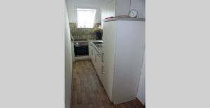 Kuchyň nebo kuchyňský kout v ubytování Apartment Peters