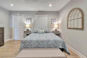 A bed or beds in a room at Private Condo - Walk Downtown - Bike to Beach - Explore Cape