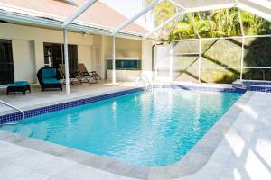 Bazén v ubytování Family Vacation Home in Fort Myers nebo v jeho okolí
