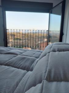 Postel nebo postele na pokoji v ubytování La Costurera