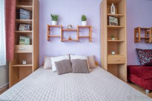 Posteľ alebo postele v izbe v ubytovaní Apartmán Palenica