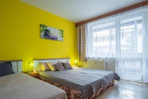 Posteľ alebo postele v izbe v ubytovaní Apartmán Palenica