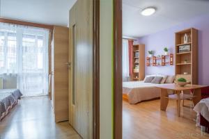 Posteľ alebo postele v izbe v ubytovaní Apartmán Palenica