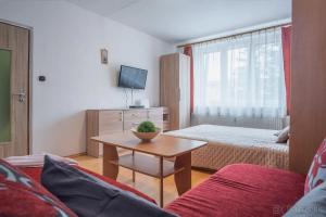 Posteľ alebo postele v izbe v ubytovaní Apartmán Palenica