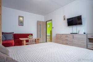 Posteľ alebo postele v izbe v ubytovaní Apartmán Palenica