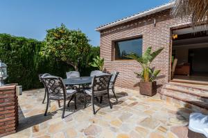 Patio alebo iná vonkajšia časť ubytovania Villa mariposa