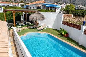 Bazén v ubytovaní Villa mariposa alebo v jeho blízkosti