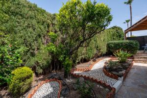 Vonkajšia záhrada v ubytovaní Villa mariposa