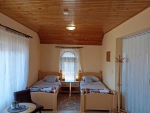 Un pat sau paturi într-o cameră la Apartman Sekulić