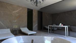 Kylpyhuone majoituspaikassa Luxury Vibes Boutique Hotel & Spa