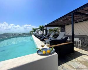 Bazén v ubytování Suite de Lujo 1 Hab. Depto. 202 nebo v jeho okolí