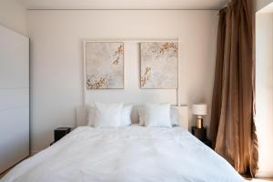 Villa Maria Boutique Apartment St Pauls客房内的一张或多张床位