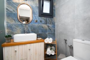 Ένα μπάνιο στο Golden Seashell Apartment