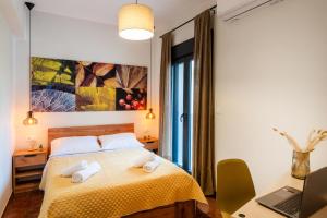 Ένα ή περισσότερα κρεβάτια σε δωμάτιο στο Golden Seashell Apartment