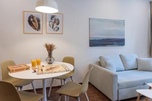 Χώρος καθιστικού στο Golden Seashell Apartment