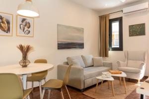 Χώρος καθιστικού στο Golden Seashell Apartment