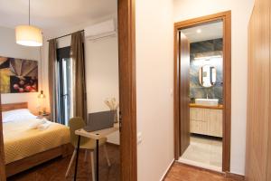 Postel nebo postele na pokoji v ubytování Golden Seashell Apartment
