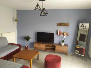 TV a/nebo společenská místnost v ubytování Silkes Apartment