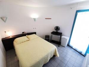 Voodi või voodid majutusasutuse Résidence ILE DES PECHEURS - Maisons & Villas pour 6 Personnes 54 toas