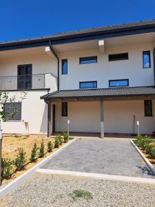 a house with a driveway in front of it at Villa Corina in Vaccarizzo Albanese