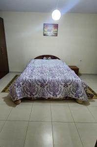 Een bed of bedden in een kamer bij Lucky's apartment, a place to be