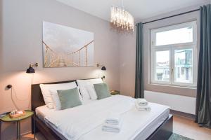 Postel nebo postele na pokoji v ubytování Prague apartment Spalena