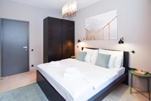 Postel nebo postele na pokoji v ubytování Prague apartment Spalena