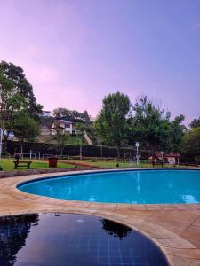 Bazén v ubytování Sitio esperança nebo v jeho okolí