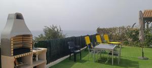 Ogród w obiekcie La Torrecica, con carácter andaluz y magníficas vistas al mar y Sierra Nevada