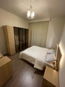 Postel nebo postele na pokoji v ubytování apartment in allegria residence