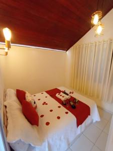 Кровать или кровати в номере Pousada Sitio Pauletto Chales e Casas com cozinha