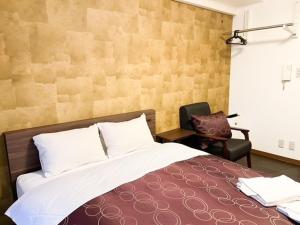 Postel nebo postele na pokoji v ubytování Comfort stay Miyabi
