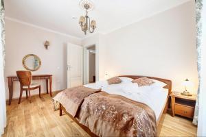 Postel nebo postele na pokoji v ubytování Leśna Polana- blisko centrum, Mini Spa, cicha, spokojna okolica, parking gratis + 48 fotografií