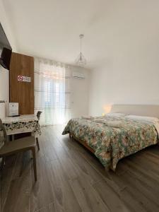 Ein Bett oder Betten in einem Zimmer der Unterkunft B&B Rifugio San Francesco