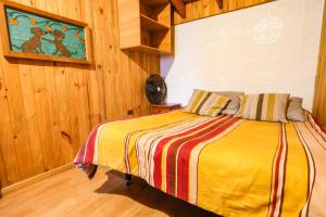 Postel nebo postele na pokoji v ubytování Hostal Maitahue + 63 fotografií